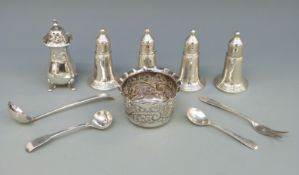 A set of four white metal peppers marked Empire Sterling, Edward VII hallmarked silver bowl,