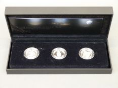 A cased 30th Anniversary of the £1 coin silver proof three coin set,
