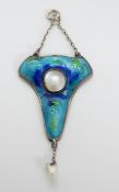 A silver pendant set with blue and green enamel and two pearls in the Liberty style by Gourdel