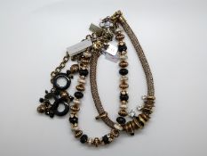 Three Bulatti necklaces and a Bulatti ring