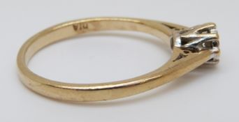 A 9ct gold ring set with a diamond in a star setting, 2.