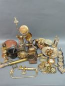 A collection of brassware to include blow lamp, horse brasses, garden sprayer, embossed jug,