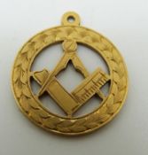 An 18ct gold Masonic fob,