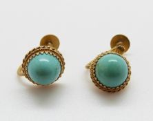 A pair of 9ct gold earrings set with turquoise cabochons