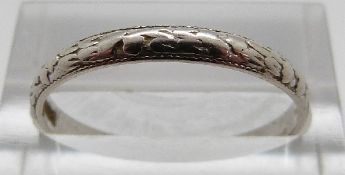 A platinum wedding band, size R,