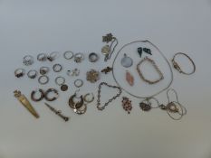 Nine silver rings, two silver bracelets, silver pendants including rose quartz, silver earrings,