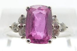 An 18ct white gold ring set with a pink sapphire of approximately 1.