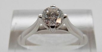 An 18ct white gold ring set with a modern round brilliant cut diamond of approximately 0.
