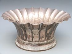 A Danish white metal fluted bowl with Danish silver marks for 1931 maker Christian F Heise,