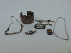 A silver bangle, silver necklace, Egyptian brooch, lucite brooch,