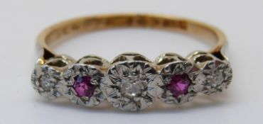 An 18ct gold ring set with rubies and diamonds in a platinum setting, size J/K, 2.