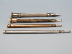 Propelling pencil, toothpick with yellow metal mount,