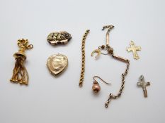 A section of Victorian chain with tassel end, a yellow metal Victorian fob section,