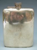 A George V hallmarked silver hip flask with bayonet cap and marked Rd No 649007,