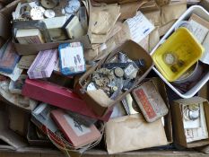 Quantity of wristwatch and pocket watch parts including glass, dials, mechanisms and packs.