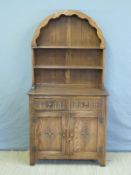 A Dutch style elm dresser with plate rack to top,