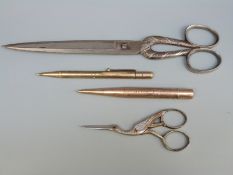 A yellow metal F.Baker & Son propelling pencil marked 9ct and also stamped Rd No.565713, length 11.