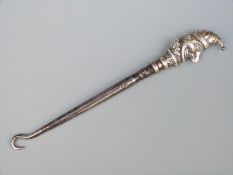 An Edward VII hallmarked silver handled Punch button hook,