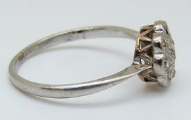 An 18ct white gold ring set with diamonds in a cluster (size R)