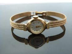 Avia 9ct gold ladies ladies wristwatch with gold hands and baton markers,