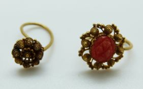 An early Victorian gold filigree earring and a similar example set with coral