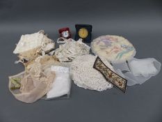 A collection of lace including 19thC and an 8m length, a possibly Chinese embroidered piece,