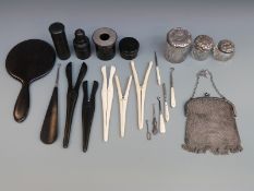 An ebony dressing table set including a silver mounted piece London 1909, button hooks,