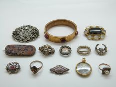 A Victorian silver brooch set with paste and applied hearts, other Victorian paste brooches,