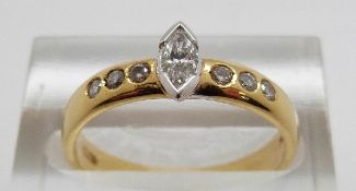 An 18ct gold ring set with a marquise cut diamond, size M, 3.