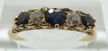 A late Victorian / early Edwardian ring set with three sapphires and two diamonds, size M, 2.