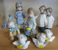 Seven Nao and Lladro figures including three putti or cherubs and a jester
