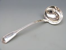 A 19thC Fiddle and Thread pattern white metal ladle, marks indistinct, possibly over stamped,