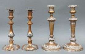 Two pairs of 19thC plated candlesticks, one pair impressed D & G Holy and Co,