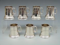 A set of seven novelty white metal miniature glass bottomed tankards all marked Moran Polo Club,