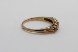 A 9ct gold ring set with diamonds and sapphires, size P/Q, 2.