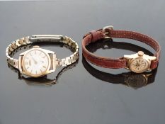 Two 18ct gold ladies wristwatches, one MuDu with gold hands and baton markers,