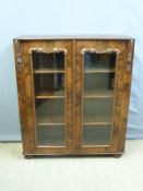A 19thC flame mahogany two door glazed bookcase,