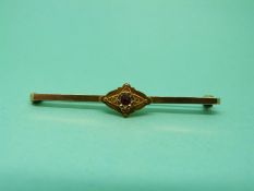 A 9ct gold brooch set with a pink paste and seed pearls, 2.