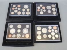Four Royal Mint UK proof coin collections comprising 2008, 2009, 2010 and 2011,