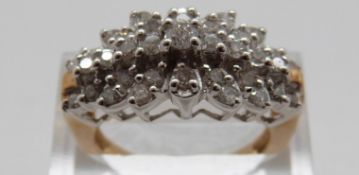 A 9ct gold ring set with diamonds in a large cluster, size P, 5.