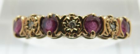 A 9ct gold ring set with alternating diamonds and rubies