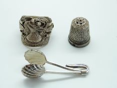 A silver thimble,