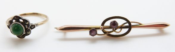 A 9ct gold and silver ring set with marcasite and a 9ct gold brooch set with amethysts