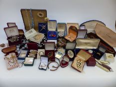 A collection of costume jewellery to include Mizpah brooch,