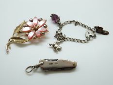 A silver charm bracelet,