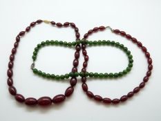 Two cherry amber necklaces, 46g (largest bead 2.1 x 1.