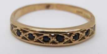 A 9ct gold ring set with sapphires and a 9ct gold ring set with sapphires and cubic zirconia,