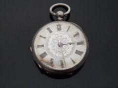 A continental white metal cased ladies fob watch with silver dial and applied Roman numerals,