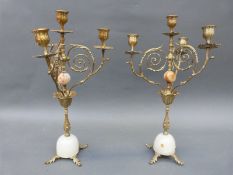 A pair of French brass and alabaster candelabra,