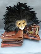 A Venetian feather mask, gents leather vanity case,
